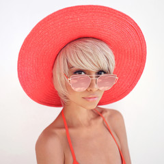 Beautiful lady in red hat and sunglasses