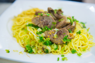 Chinese yellow noodle with boiled pork bone