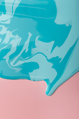 Abstact painting with mix of blue liquid colors