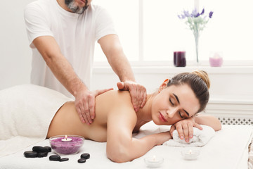 Obraz na płótnie Canvas Classical body massage at spa salon
