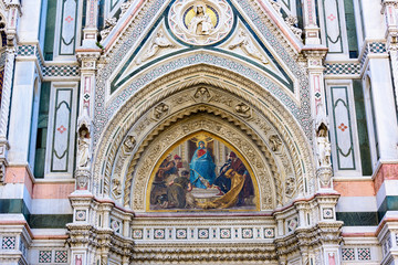 Fototapeta na wymiar Detail of decor of Florence Cathedral of Saint Mary of the Flower, Florence Duomo (Duomo di Firenze) in Florence, Italy