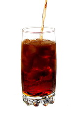 pouring cola into a glass with ice cubes, isolated on white background