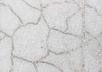 Obraz premium Perspective View Monotone Gray Brick Stone Pavement on The Ground for Street Road. Sidewalk, Driveway, Pavers, Pavement in Vintage Design Ground Flooring Square Pattern Texture Background for mock up