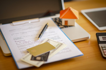 Rental agreement document with keys and Credit Cards