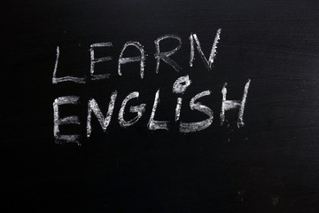 Learn english text written on chalkboard