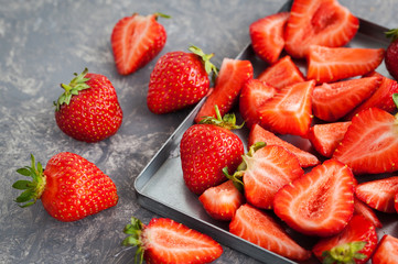 Fresh strawberry on gray background