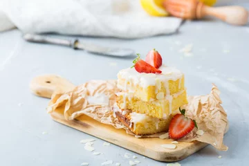 Foto auf Leinwand Homemade lemon polenta cookie bars with white icing © aamulya