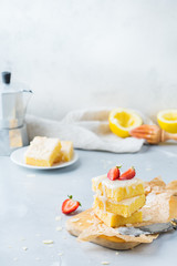 Homemade lemon polenta cookie bars with white icing