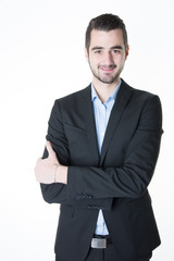 Handsome smiling confident businessman portrait arms crossed