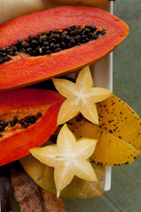 Papaya, mango, lychee, lie on one plate