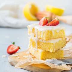 Homemade lemon polenta cookie bars with white icing
