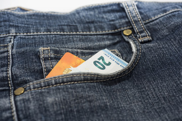 Euro banknotes in jeans.