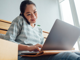 Happy woman online store owner receiving order from customer. Concept of online store digital business owner.