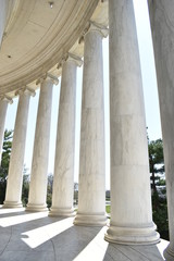 Closeup of white stone pillars at the Jefferson Monument on Lake Tidal Basin in Washington D.C in the USA