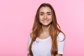 young woman on pink background Attractive beautiful woman showing air kiss