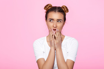 Fototapeta premium young woman on pink background Attractive beautiful woman showing air kiss