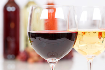Red wine in a glass bottle