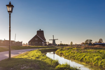 Fototapeta na wymiar Windmills in Zaanse Schans - Holland Netherlands