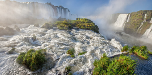 Amazing Iguazu falls, summer landscape with scenic waterfalls