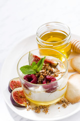 sweet yogurt with honey and fresh figs, top view
