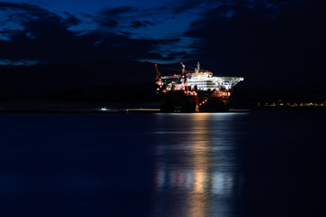 Offshore oil platform at night in arctic Norway