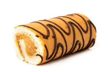 Biscuit roll doused with chocolate, closeup.