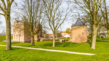 Fototapeta na wymiar Fortress Loevestein in Poederoijen, Zaltbommel, Gelderland, Netherlands. Most famous castle of the Netherlands.