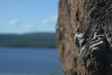The rock edge against the sky and the sea