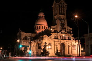 Fototapeta na wymiar Church at night and city lights