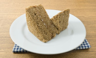 Two Delicious Triangle Coffee Chiffon Cake on A Dish