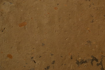 Plastered wall with sand texture.