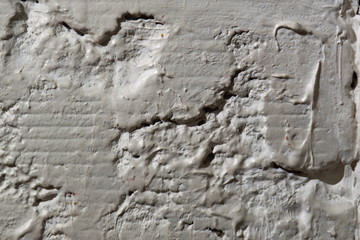 Gray wall of concrete. In the past there was a tile.