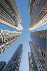 Fototapeta na wymiar A group of skyscrapers in Dubai seen from below