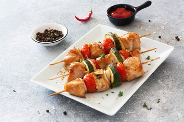 Grilled chicken , cherry tomatoes, onions and zucchini