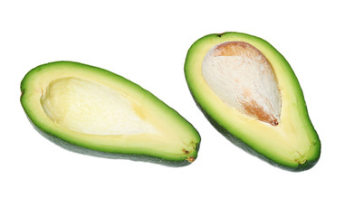 Avocado cut in half with bone on white background, isolated