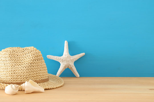 nautical, vacation and travel image with sea life style objects over wooden table.