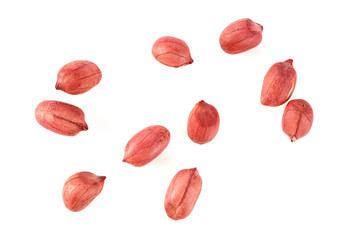 Unpeeled raw peanuts isolated on a white background