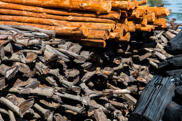 Natural wooden background - closeup of chopped firewood.