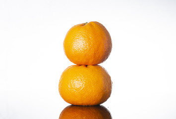 2 stacked oranges