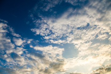 colorful dramatic sky with cloud at sunset.