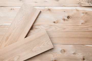 Two wooden planks of lime lie on the boards