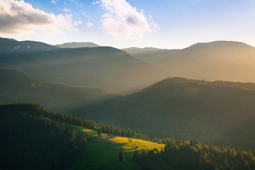 Breathtaking panorama of evening wild nature high in mountains