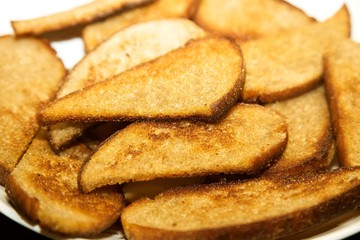 Dried bread on a plate.