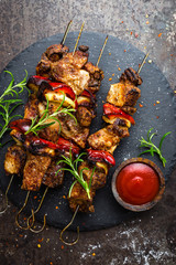 Grilled meat skewers, shish kebab with onion and sweet pepper