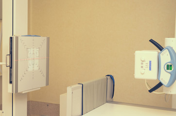 Room with an X-ray apparatus table for the production of X-ray images.
