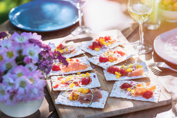 Close-up of mini sandwich on a terrace table for aperitif