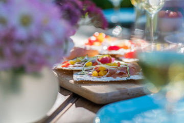 Close-up of mini sandwich on a terrace table for aperitif