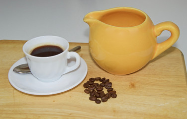 Cup and coffee beans