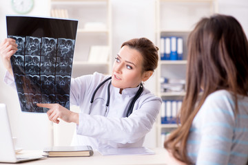 Pregnant woman visiting doctor for regular check-up