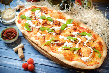 pizza with dried tomatoes